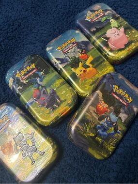 Pokemon Tin Set with Blue, Green, Yellow, Pink Artwork